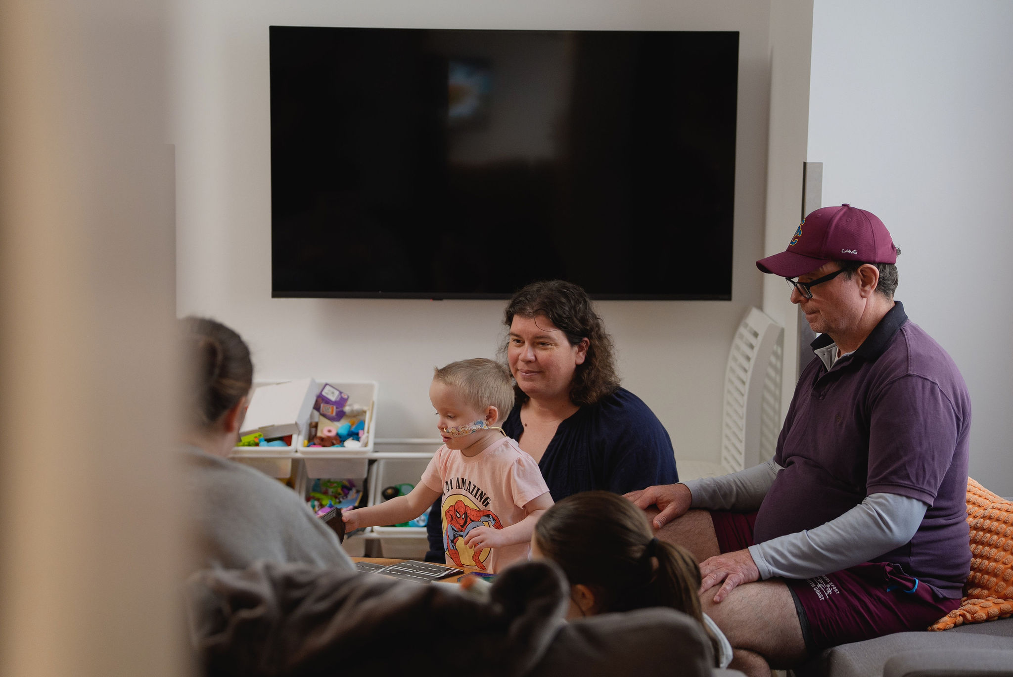 Parent's playing with children